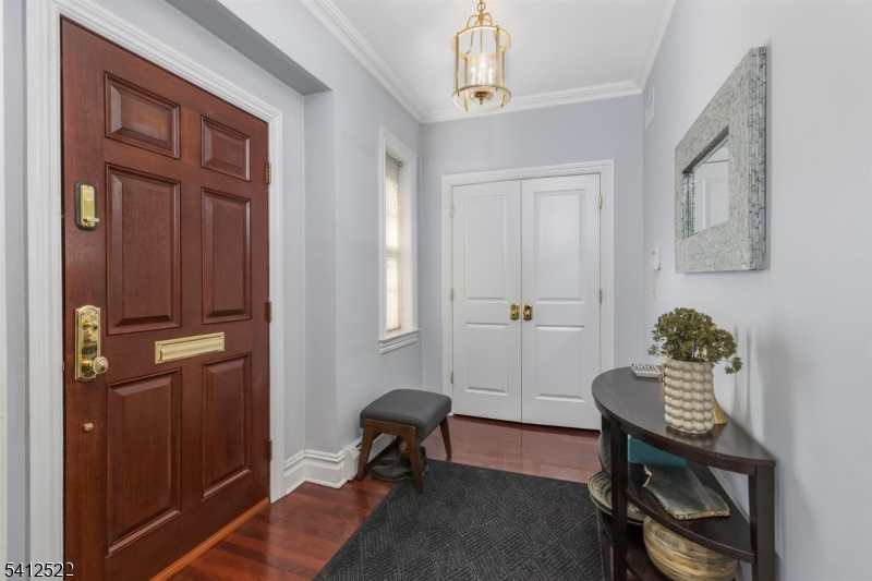 6 Harding Court Passaic, NJ 07055 - Photo 2 of 17 a view of a workspace with furniture and a window