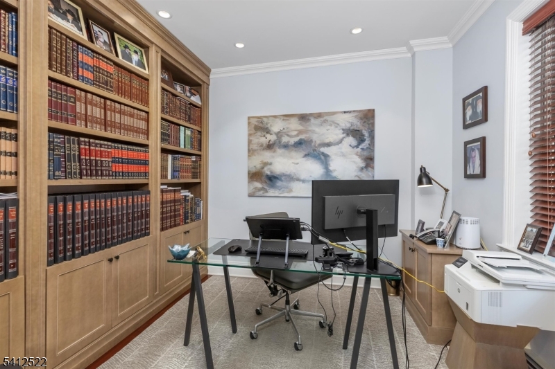 6 Harding Court Passaic, NJ 07055 - Photo 4 of 17 a living room with furniture a fireplace and a flat screen tv