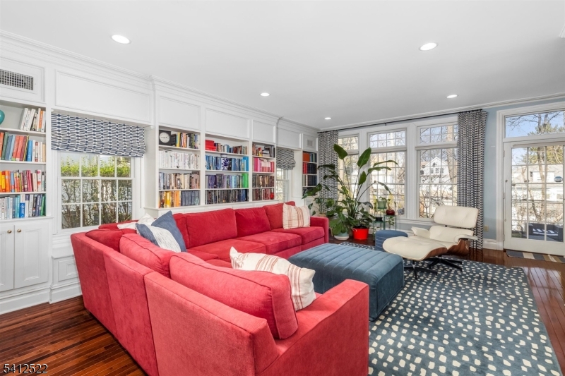 6 Harding Court Passaic, NJ 07055 - Photo 8 of 17 a living room with furniture kitchen view and a large window