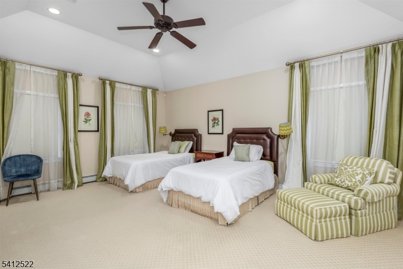 6 Harding Court Passaic, NJ 07055 - Photo 10 of 17 a bedroom with bed and a large window