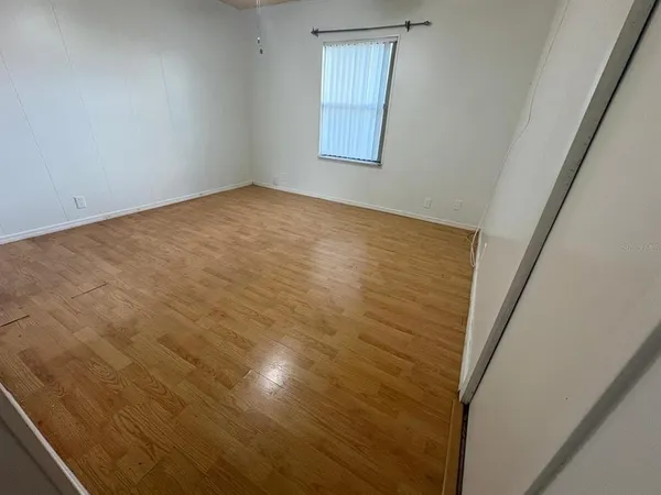 a bathroom with a sink mirror vanity and toilet