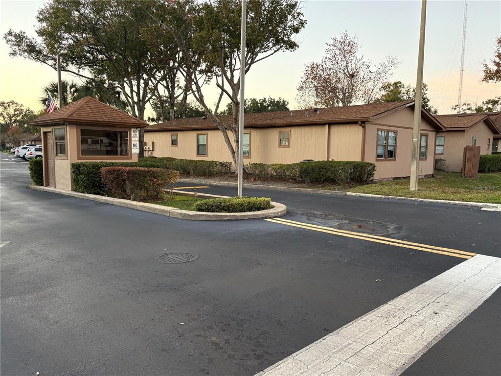 304 Eron Way, Unit 2 Winter Garden, FL 34787 - Photo 15 of 19 a front view of a house with a yard