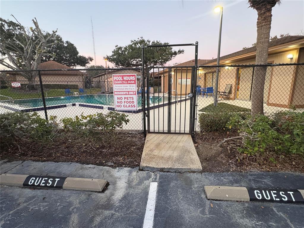 304 Eron Way, Unit 2 Winter Garden, FL 34787 - Photo 17 of 19 a view of a street with benches in front of it