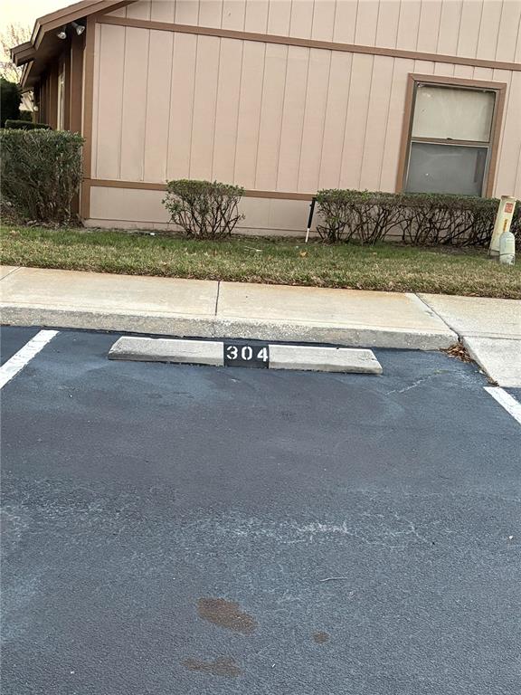 304 Eron Way, Unit 2 Winter Garden, FL 34787 - Photo 19 of 19 a view of a car parked a road