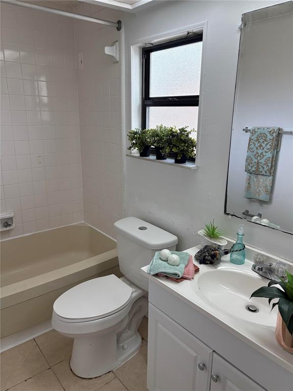 304 Eron Way, Unit 2 Winter Garden, FL 34787 - Photo 8 of 19 a bathroom with a sink a toilet and shower