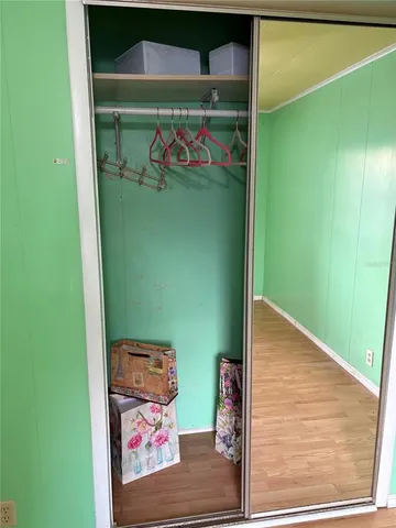 a bathroom with a sink mirror vanity and toilet