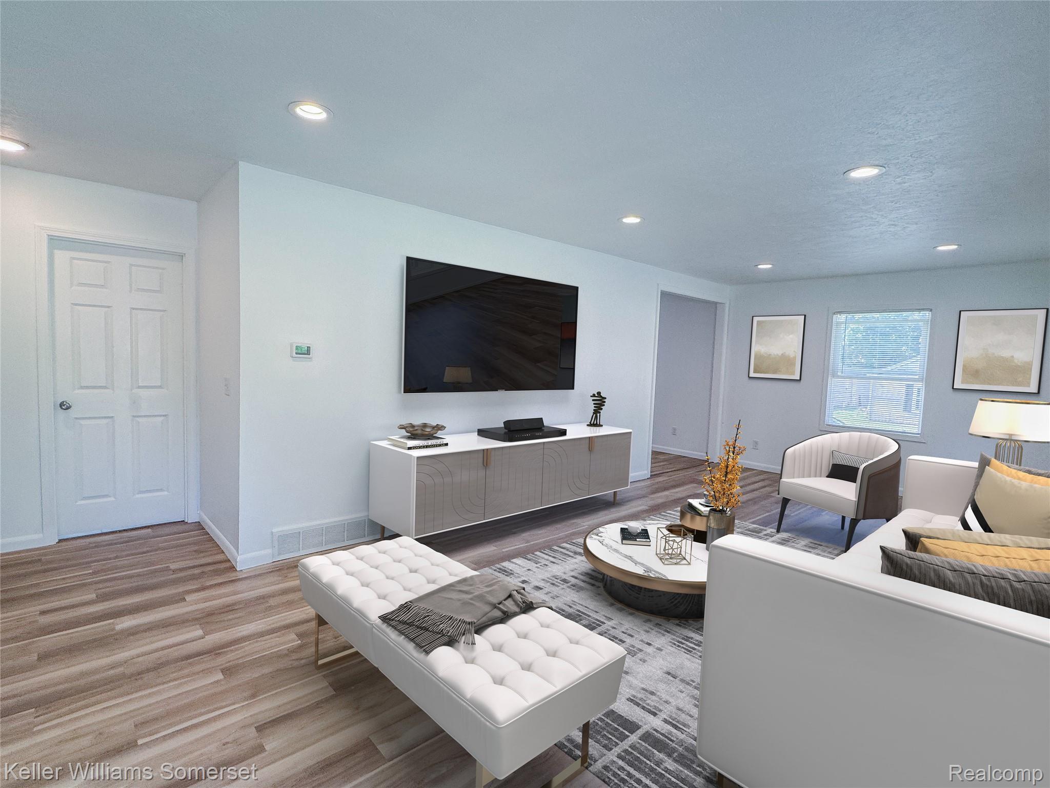 1821 Nazareth Road Kalamazoo, MI 49048 - Photo 5 of 20 Living area featuring wood-finish flooring, recessed lighting, and white walls