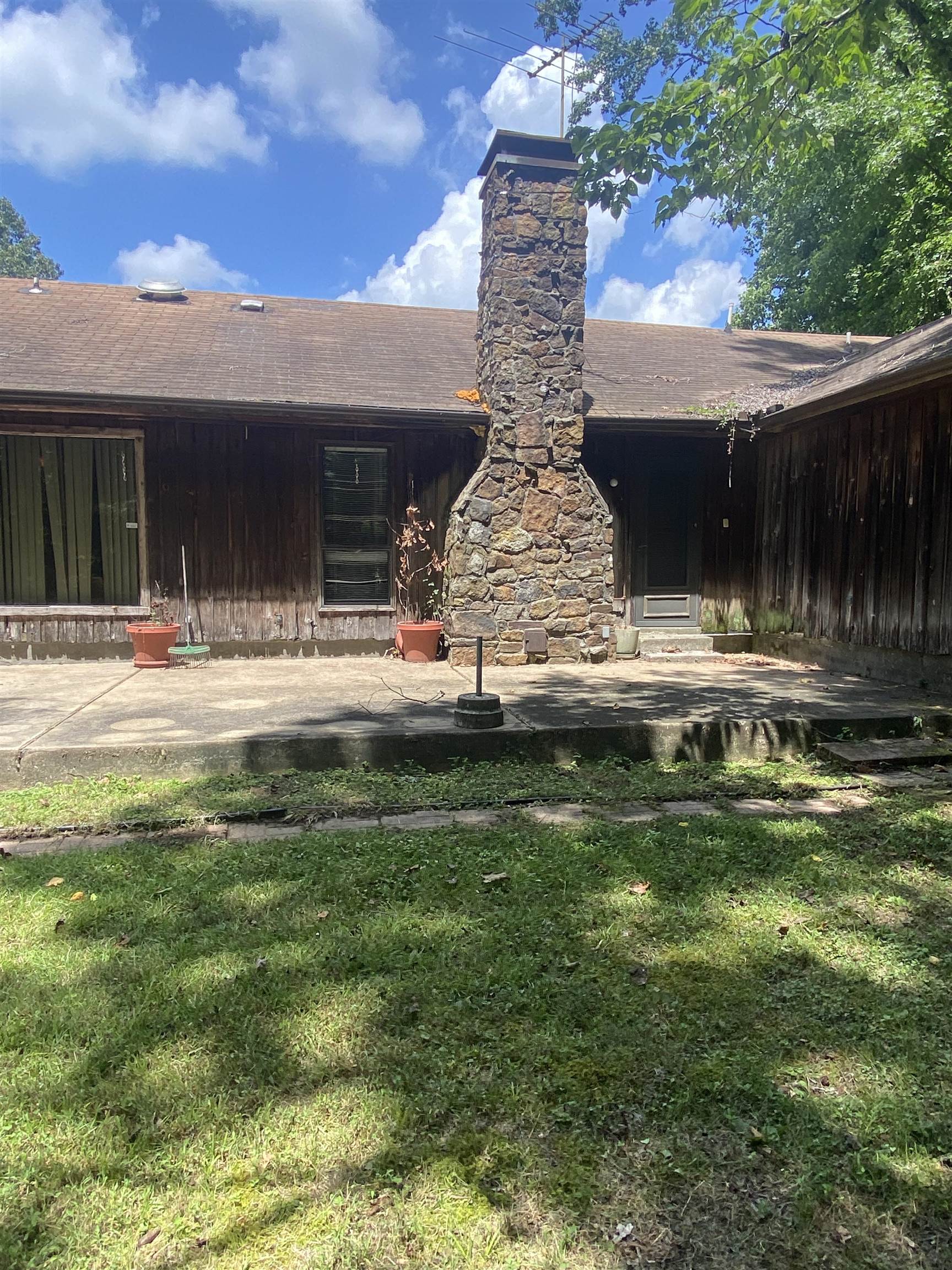 2636 Gore Road Millington, TN 38053 - Photo 3 of 12 Back of property featuring a patio and a lawn