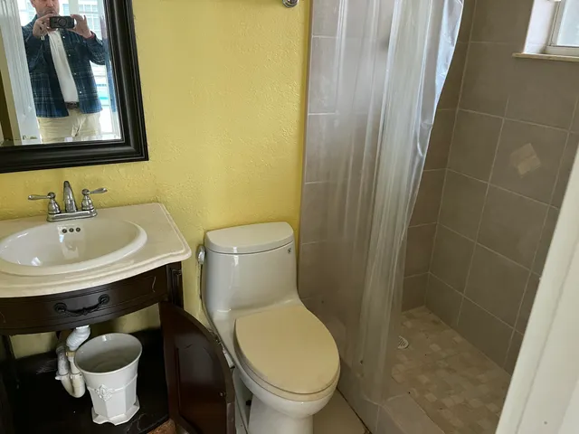 a bathroom with a sink and a toilet