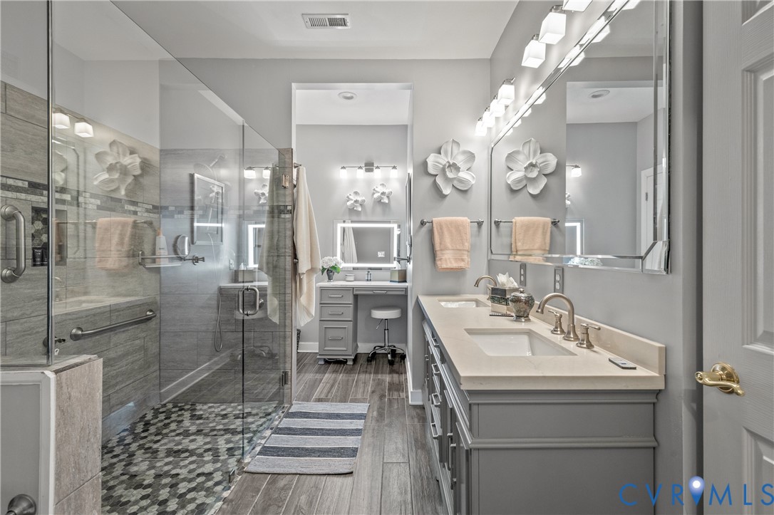 2205 Magnolia Grove Way Midlothian, VA 23113 - Photo 22 of 37 a bathroom with a sink shower and a mirror