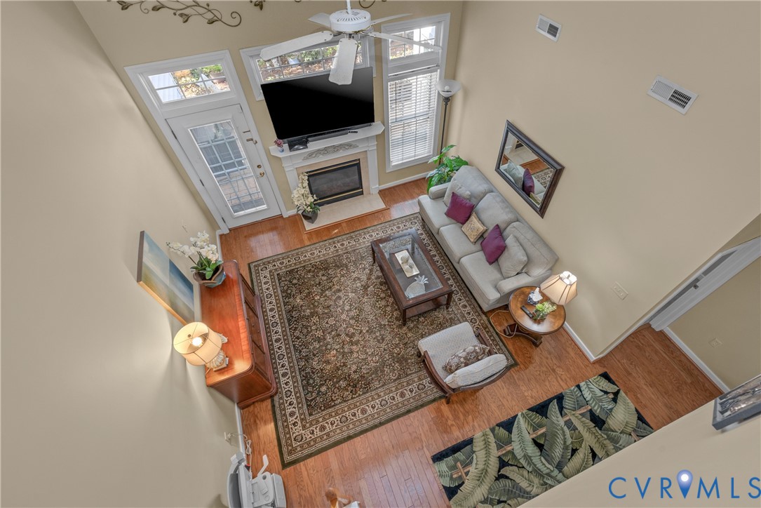 2205 Magnolia Grove Way Midlothian, VA 23113 - Photo 28 of 37 a living room with furniture and a flat screen tv