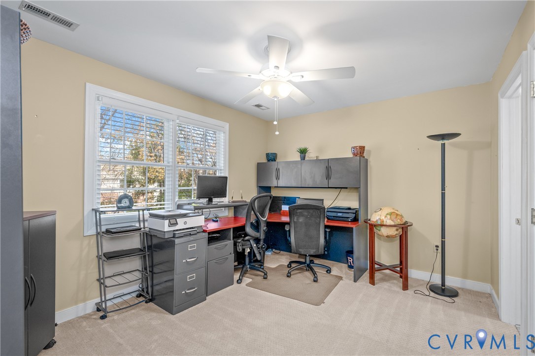 2205 Magnolia Grove Way Midlothian, VA 23113 - Photo 34 of 37 a view of a workspace with furniture and a window