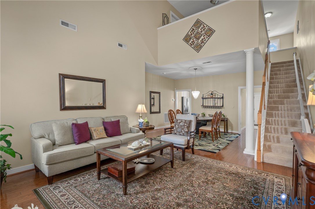 2205 Magnolia Grove Way Midlothian, VA 23113 - Photo 5 of 37 a living room with furniture and a rug