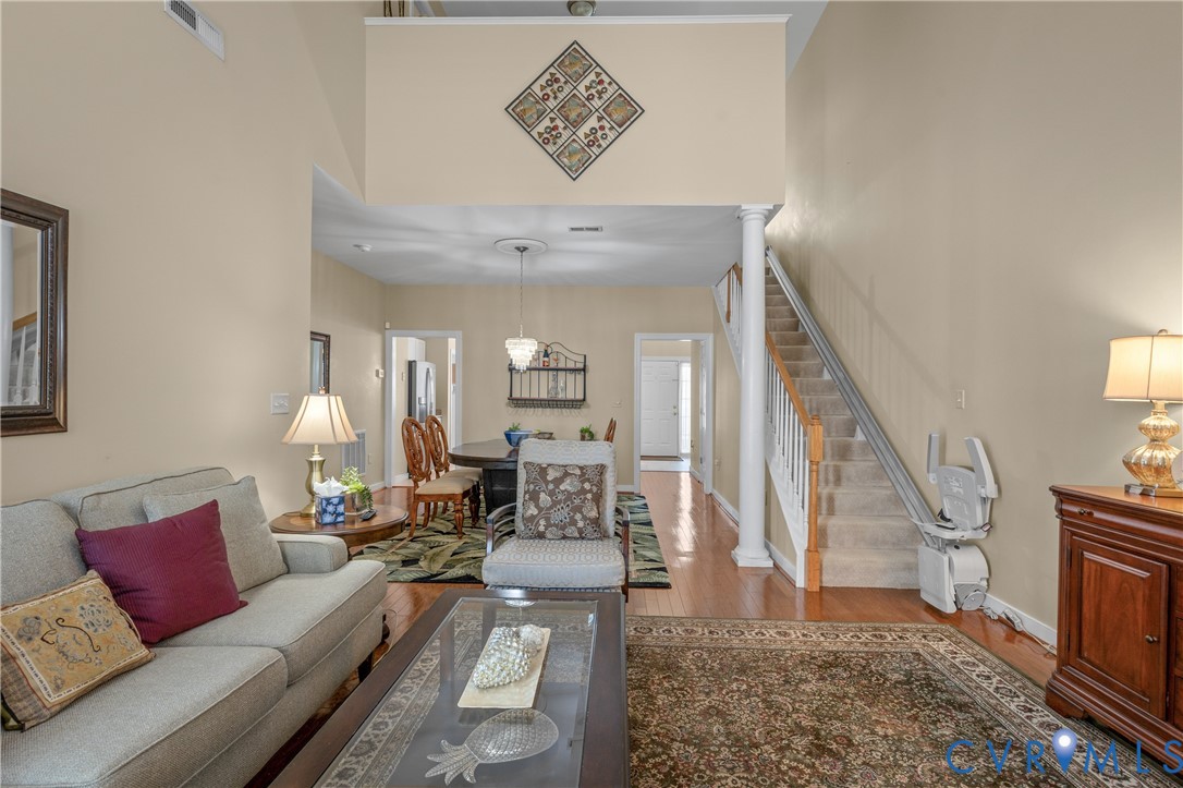 2205 Magnolia Grove Way Midlothian, VA 23113 - Photo 6 of 37 a living room with furniture and wooden floor