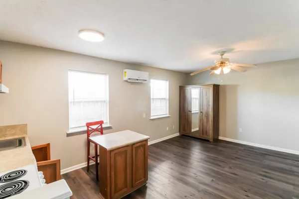 a room with furniture and window