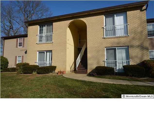 512 Harding Road, Unit 2 Freehold, NJ 07728 - Photo 1 of 12 a black and white photo of a house