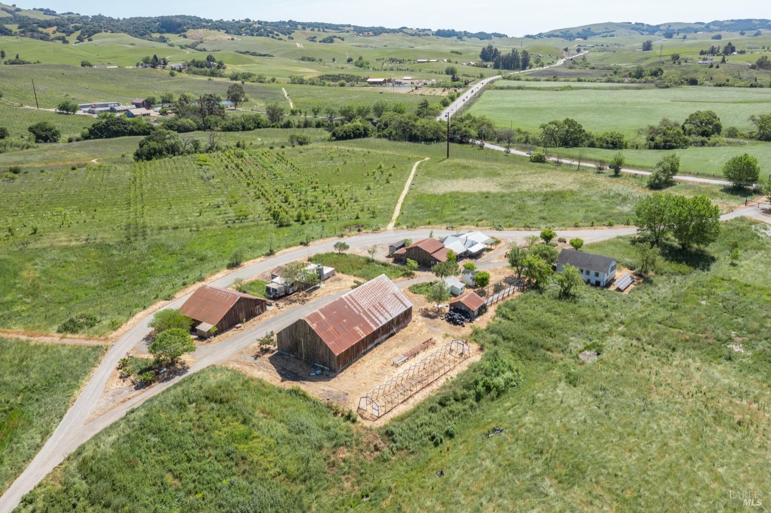 3571 Old Adobe Road Petaluma, CA 94954 - Photo 6 of 6 an aerial view of a house with a yard and lake view
