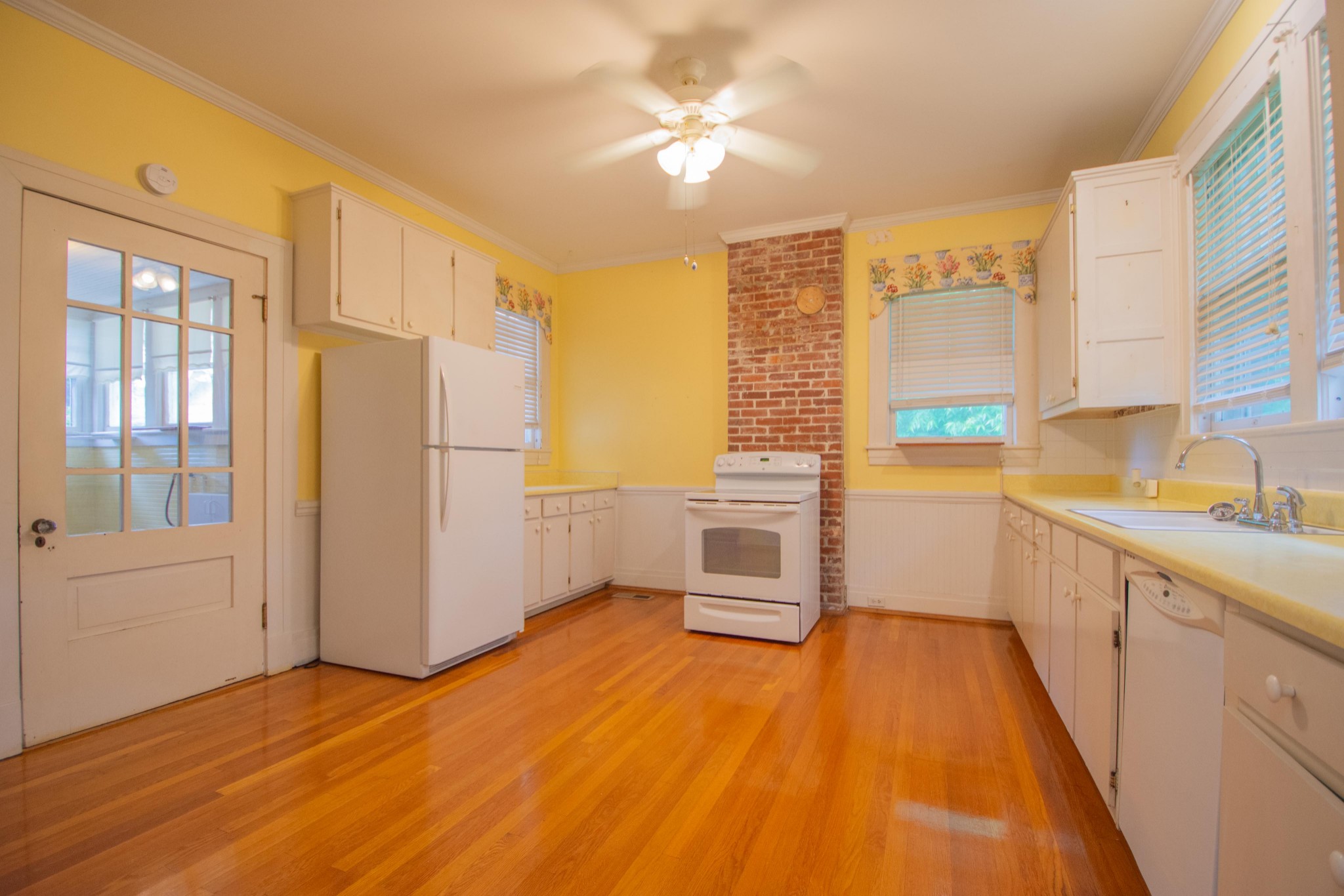 311 South 3rd Street Pulaski, TN 38478 - Photo 6 of 44 a kitchen with stainless steel appliances a stove a refrigerator and a sink