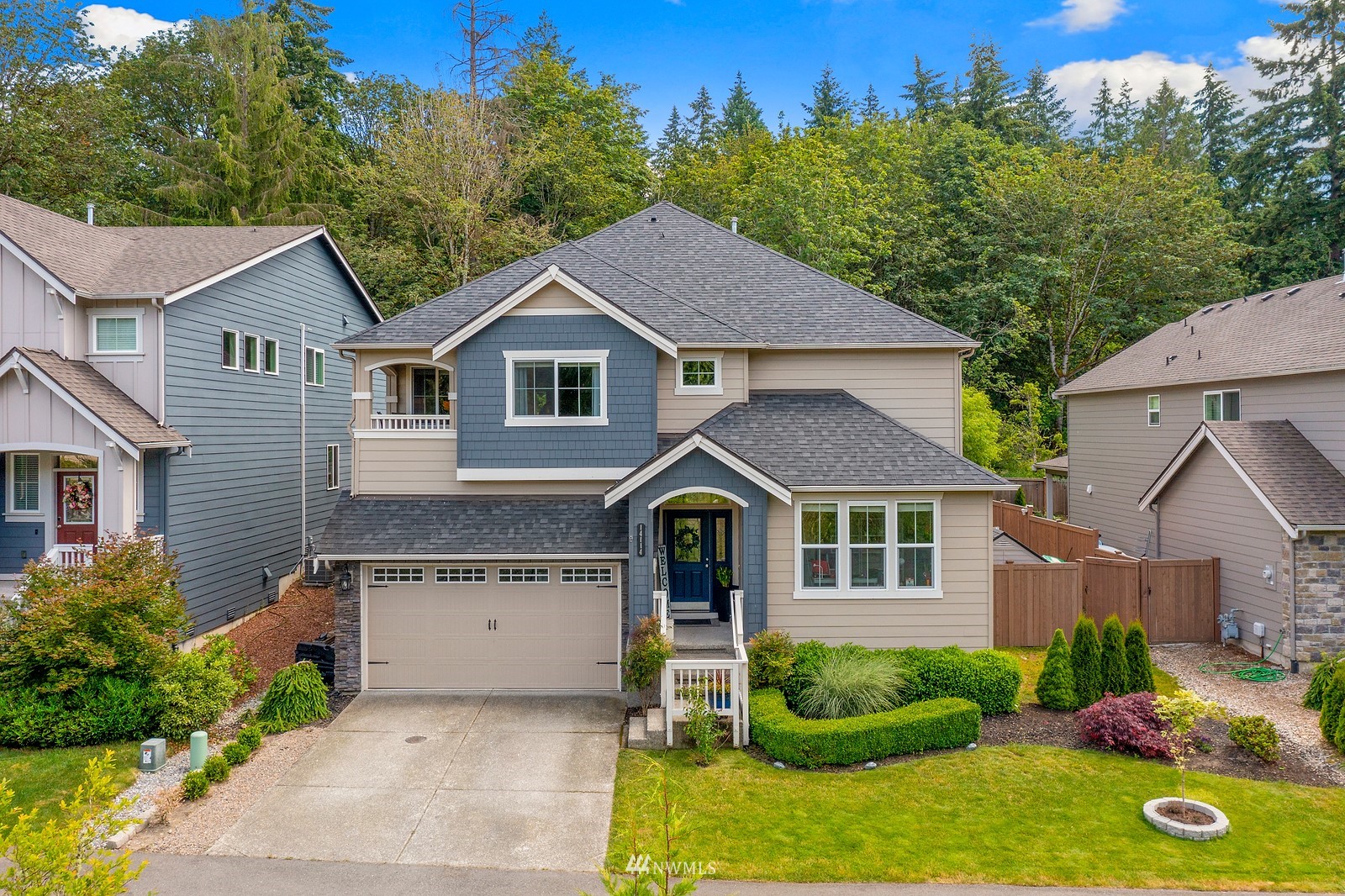 14114 163rd Place Southeast Renton, WA 98059 - Photo 1 of 33 a front view of a house with garden