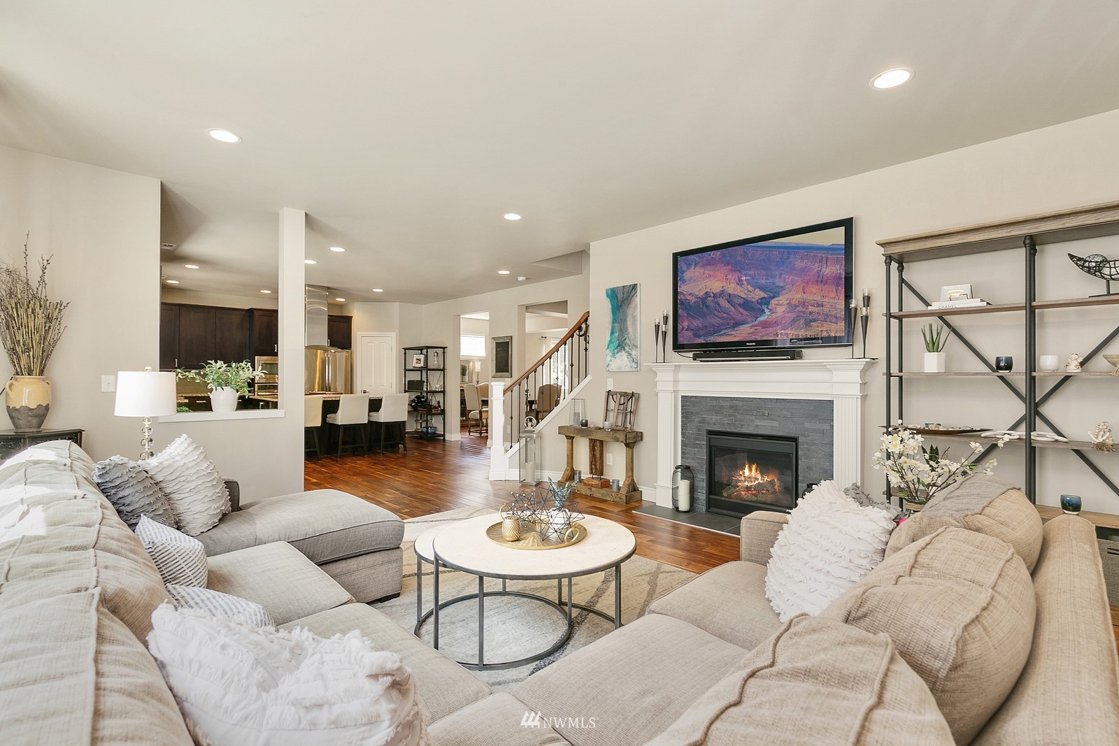14114 163rd Place Southeast Renton, WA 98059 - Photo 11 of 33 a living room with furniture and a fireplace