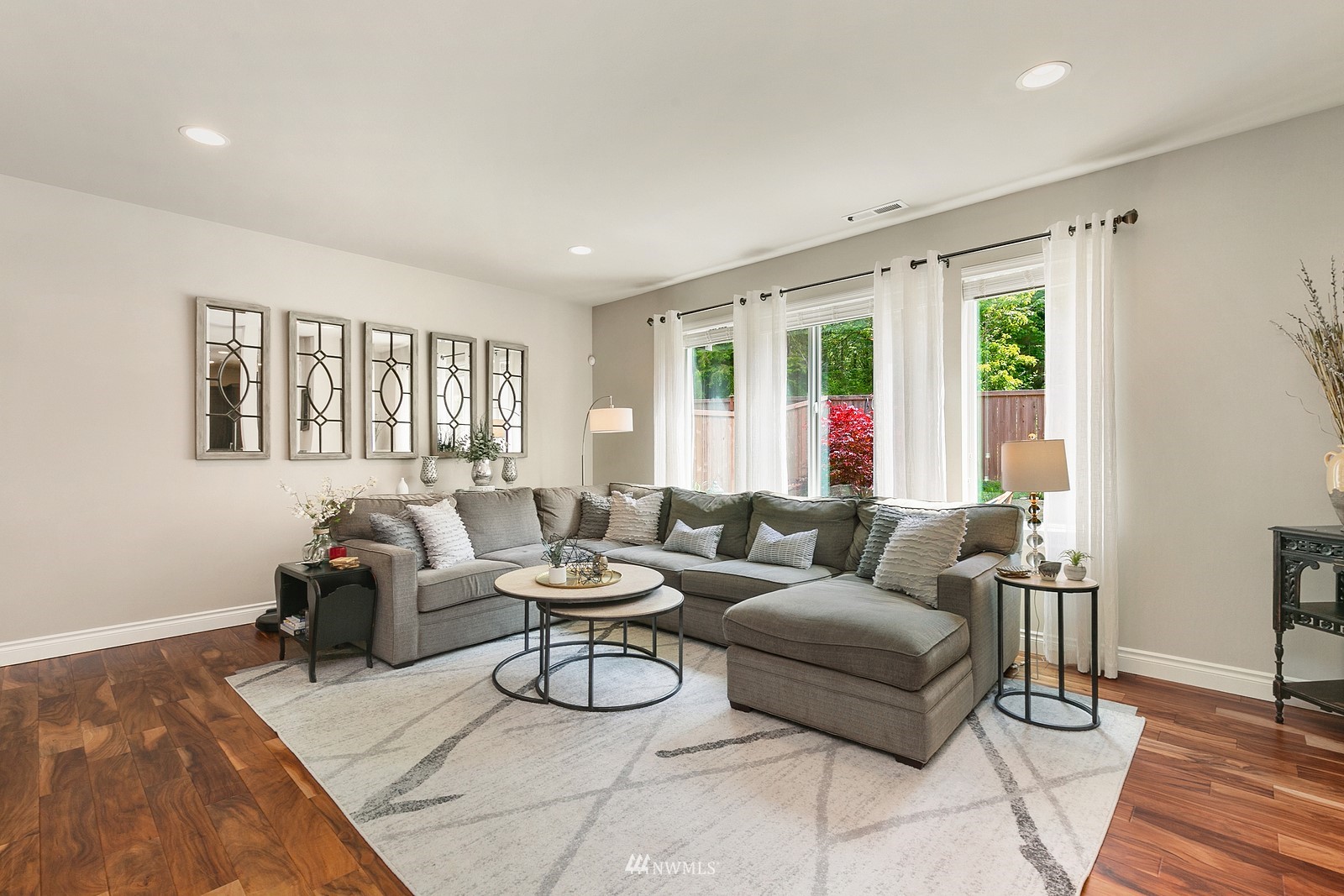 14114 163rd Place Southeast Renton, WA 98059 - Photo 12 of 33 a living room with furniture and a large window