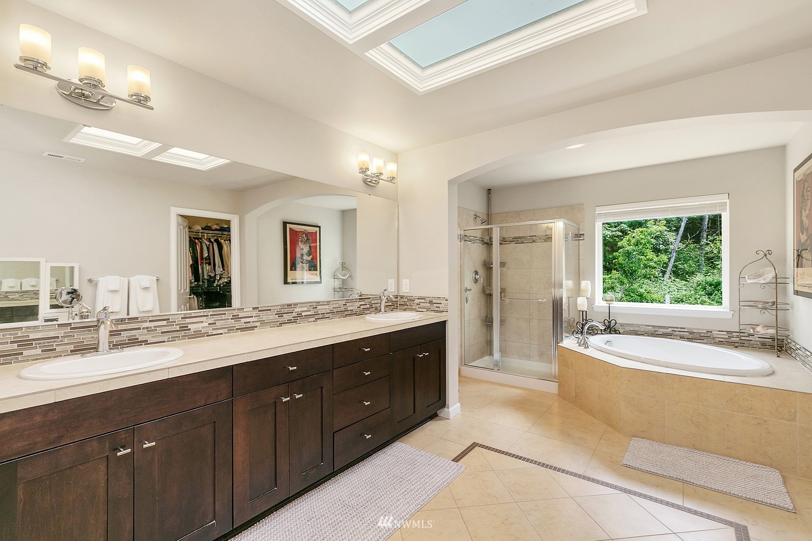 14114 163rd Place Southeast Renton, WA 98059 - Photo 17 of 33 a spacious bathroom with a tub sink shower and mirror