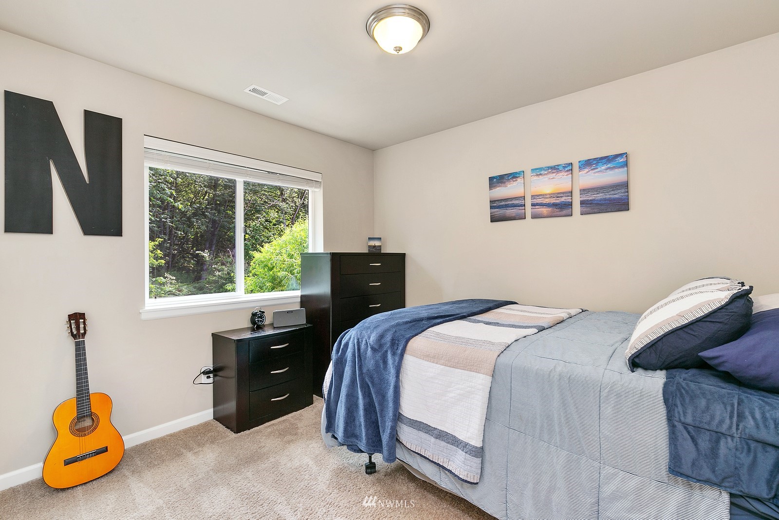 14114 163rd Place Southeast Renton, WA 98059 - Photo 20 of 33 a bedroom with a bed and a window