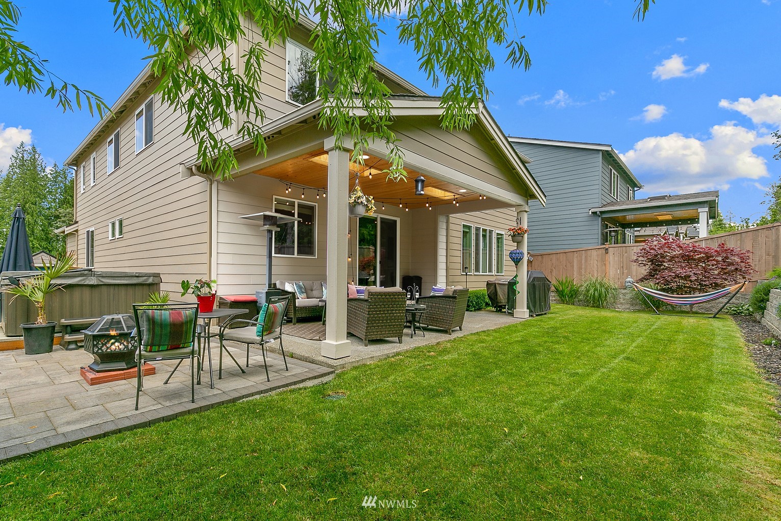 14114 163rd Place Southeast Renton, WA 98059 - Photo 24 of 33 a view of a house with a backyard