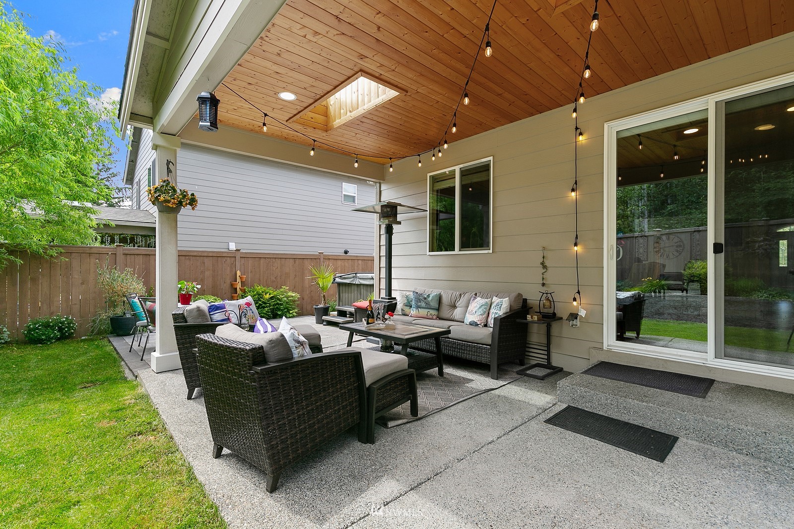 14114 163rd Place Southeast Renton, WA 98059 - Photo 26 of 33 a living room with patio furniture and garden