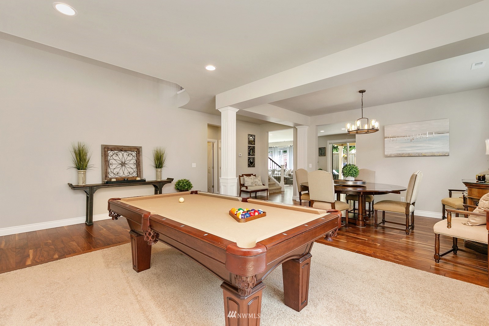 14114 163rd Place Southeast Renton, WA 98059 - Photo 4 of 33 a living room with pool table and a table