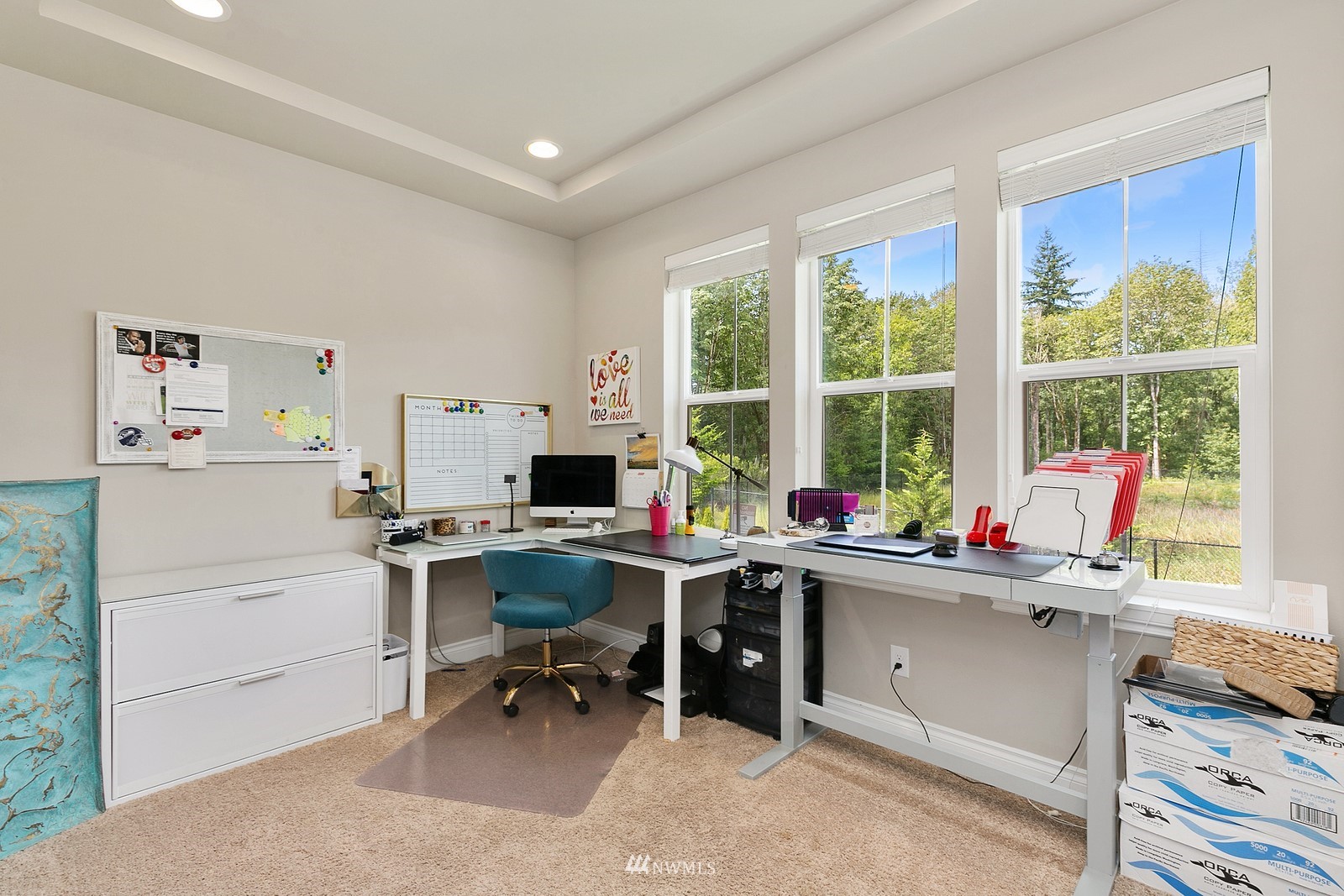 14114 163rd Place Southeast Renton, WA 98059 - Photo 6 of 33 a view of a workspace with furniture and a window