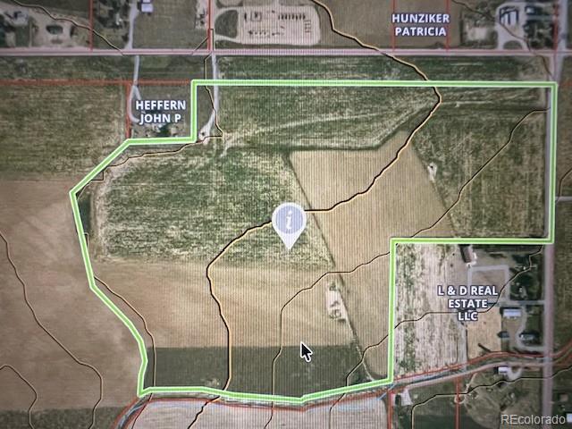 19 Tbd County Road Fort Lupton, CO 80621 - Photo 5 of 15 a sign that is on a wooden floor