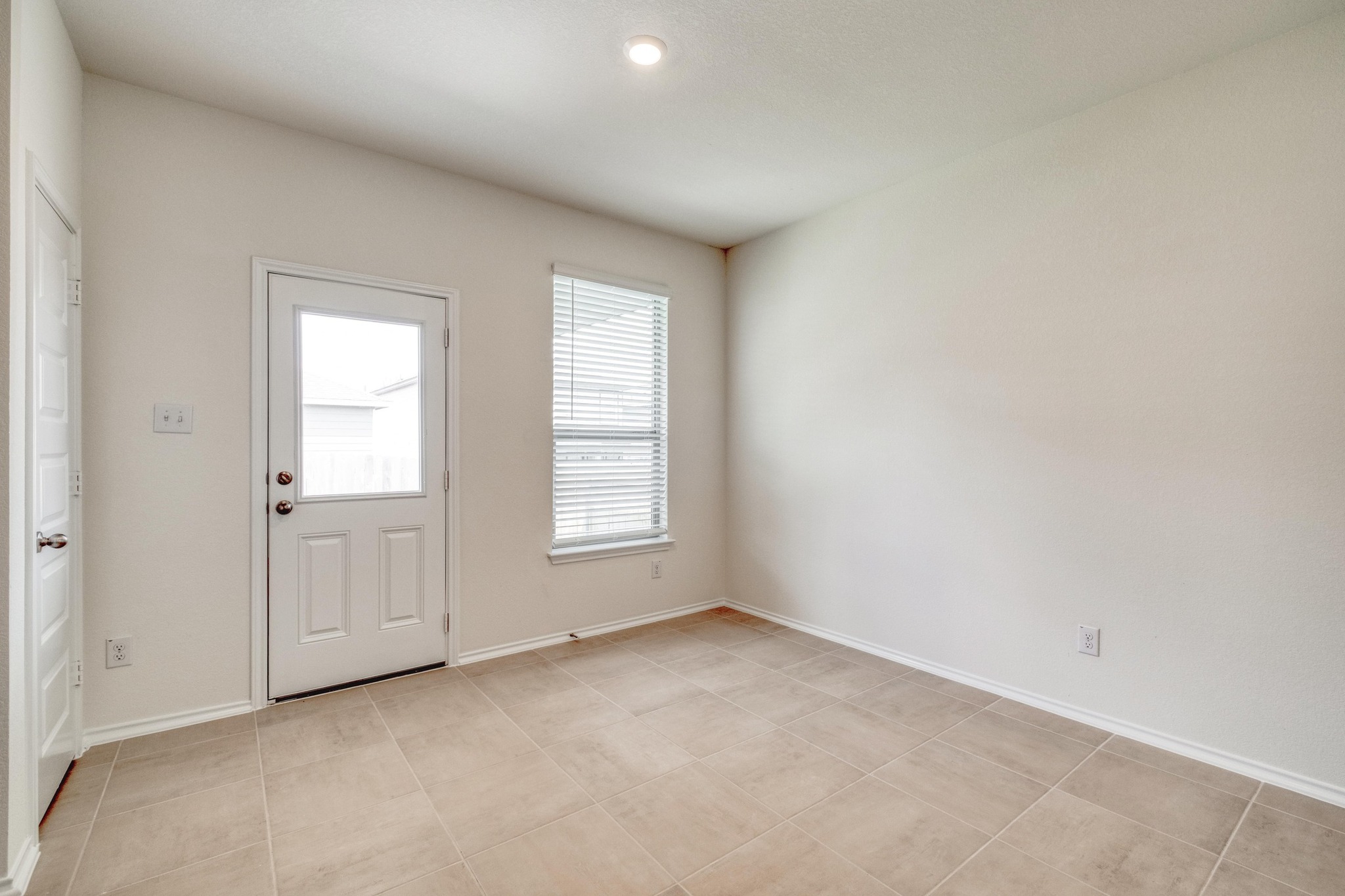 280 Feathers Street Jarrell, TX 76537 - Photo 12 of 26 an empty room with windows