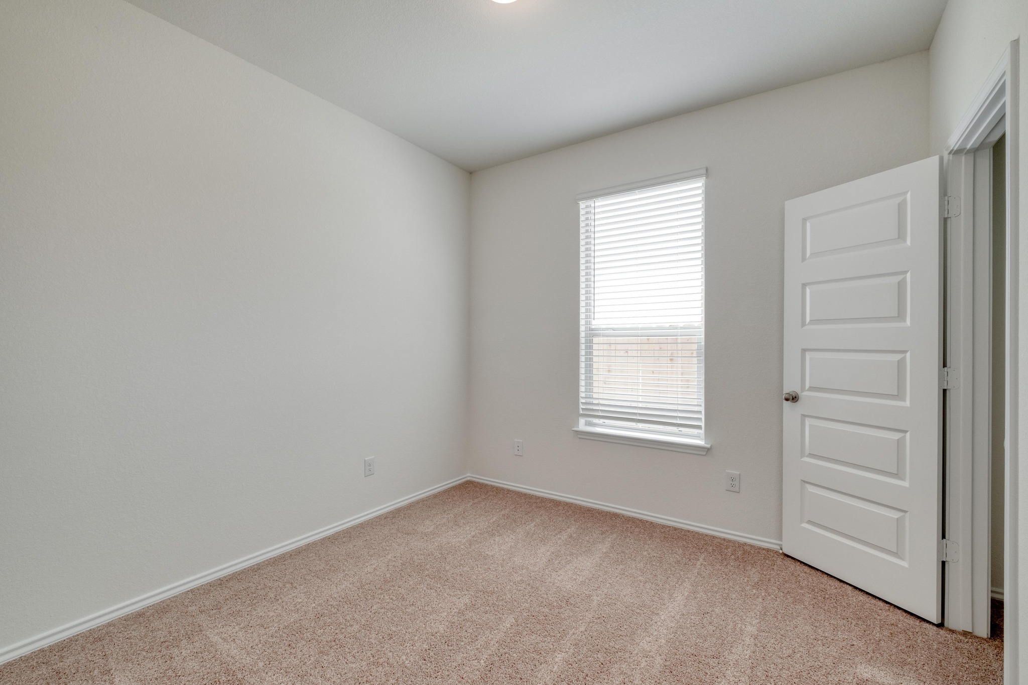 280 Feathers Street Jarrell, TX 76537 - Photo 20 of 26 an empty room with a window
