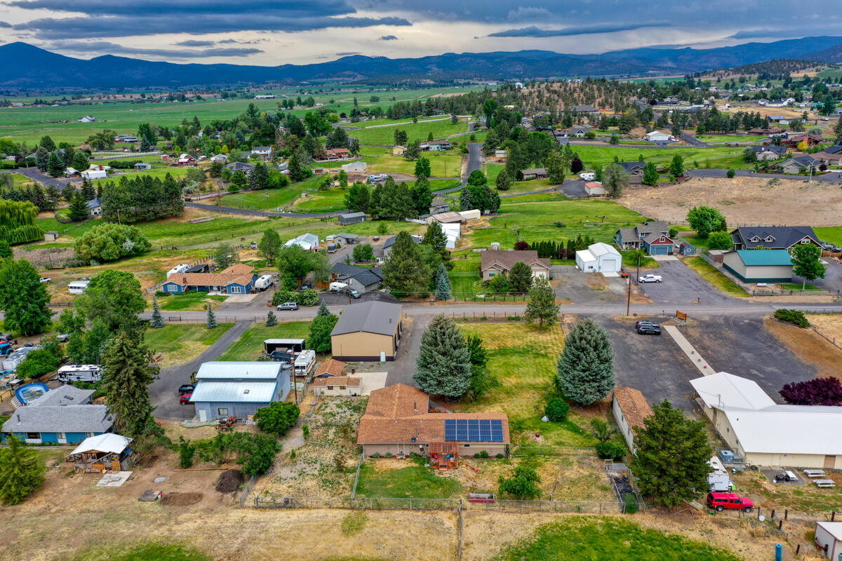 566 Northwest Mc Donald Road Prineville, OR 97754 - Photo 24 of 41 an aerial view of residential houses and outdoor space