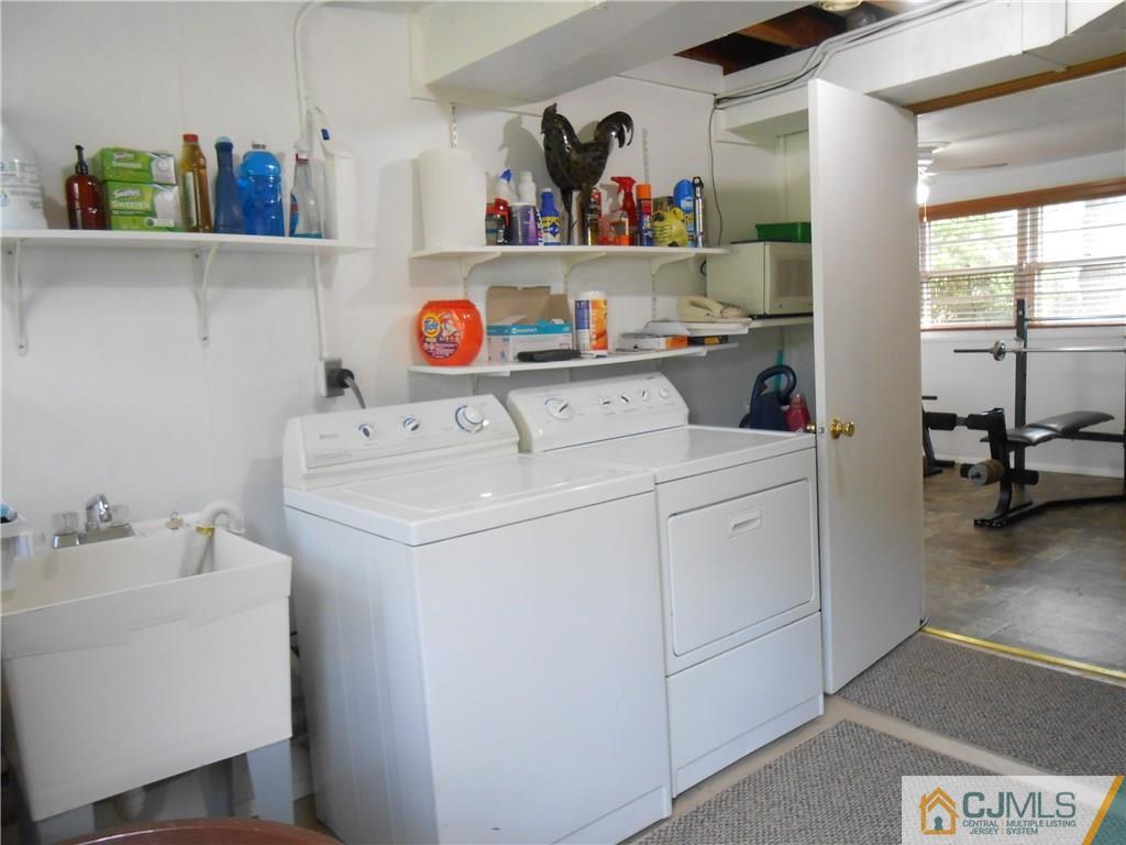 4 Maple Road Iselin, NJ 08830 - Photo 14 of 21 a utility room with dryer and washer