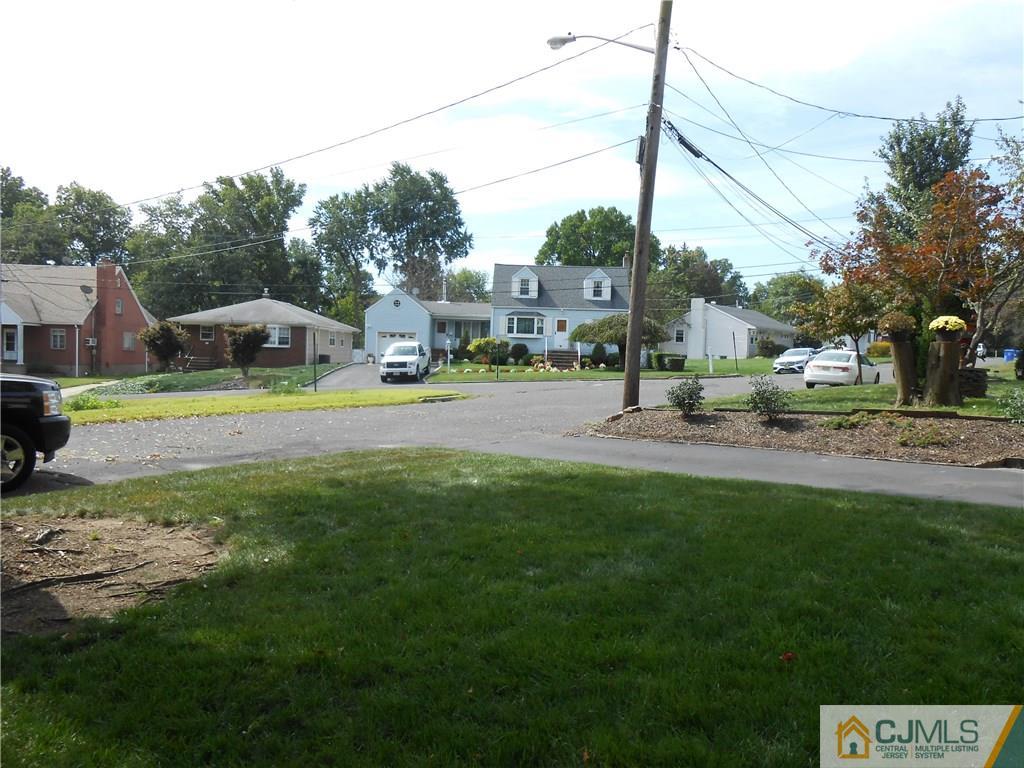 4 Maple Road Iselin, NJ 08830 - Photo 20 of 21 a childrens park with lots of swings and slides