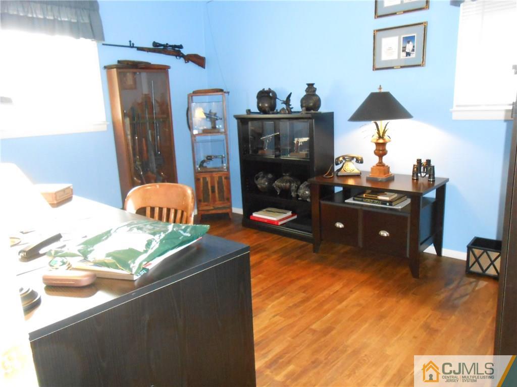 4 Maple Road Iselin, NJ 08830 - Photo 8 of 21 a living room with furniture and a flat screen tv