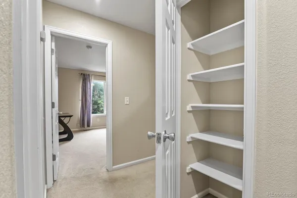 a view of an empty walk in closet
