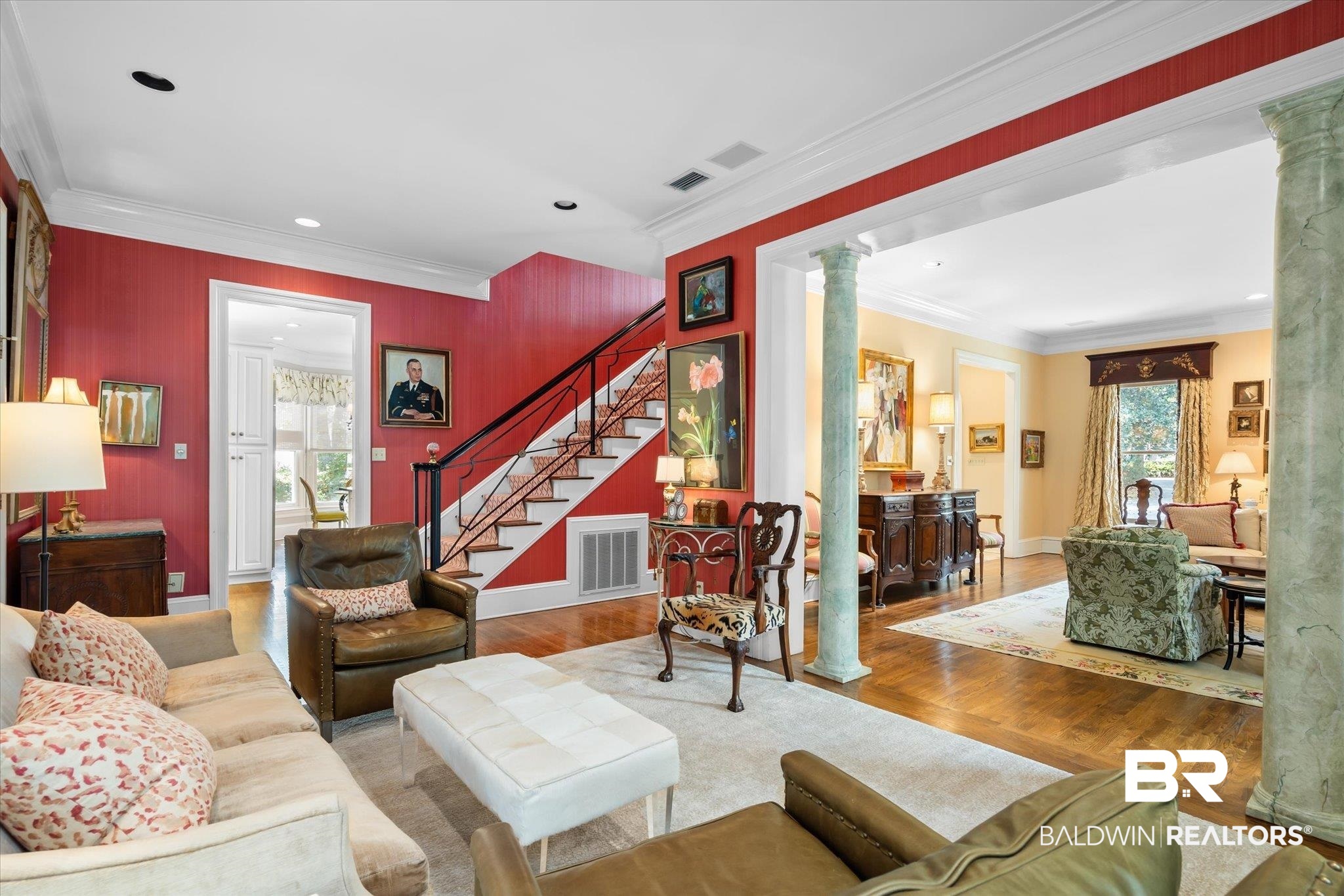354 Dogwood Lane Mobile, AL 36608 - Photo 9 of 44 Living room with crown molding, wood-type flooring, and ornate columns
