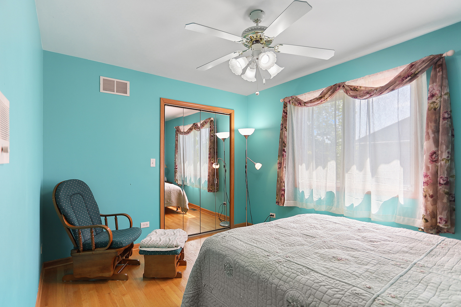 2708 High Meadow Road Naperville, IL 60564 - Photo 13 of 21 a bedroom with a bed and a chandelier