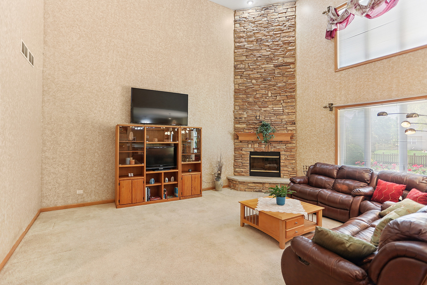2708 High Meadow Road Naperville, IL 60564 - Photo 8 of 21 a living room with furniture and a flat screen tv