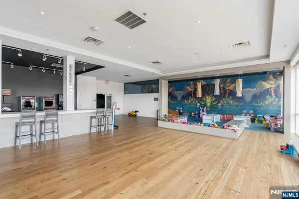 a view of a living room and dining room
