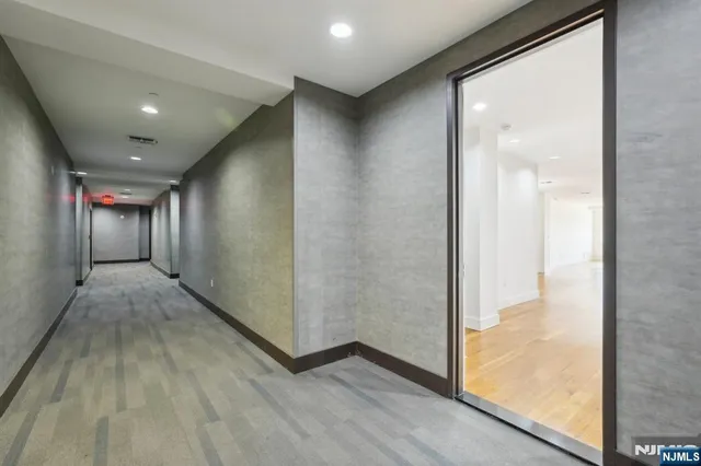 a view of hallway with livingroom