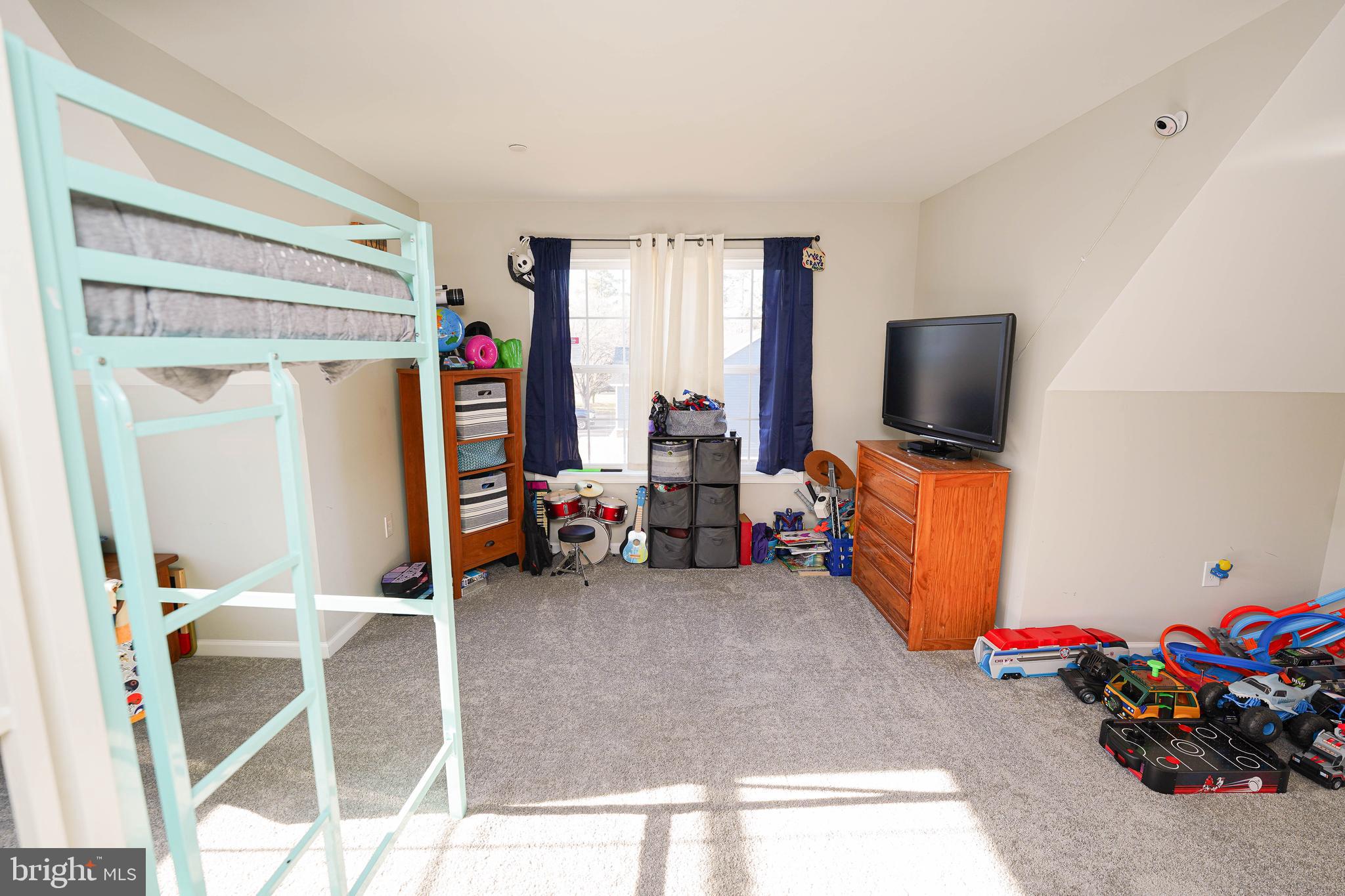 2054 Groton Road Pocomoke City, MD 21851 - Photo 36 of 42 a view of a livingroom with toys and a window