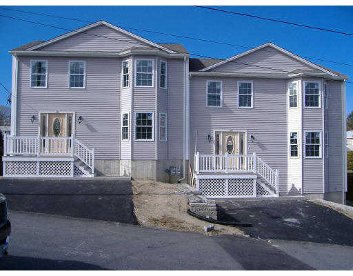 135 Carter Fall River, Unit 2 Fall River, MA 02721 - Photo 1 of 1 a front view of a house with a outdoor space