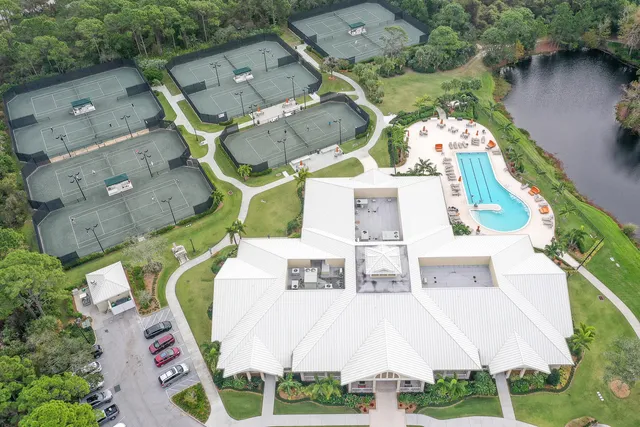 an aerial view of multiple houses with outdoor space