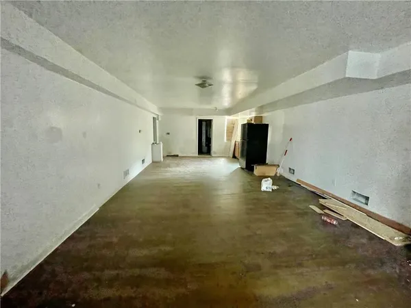 a bathroom with a sink a toilet and bathtub