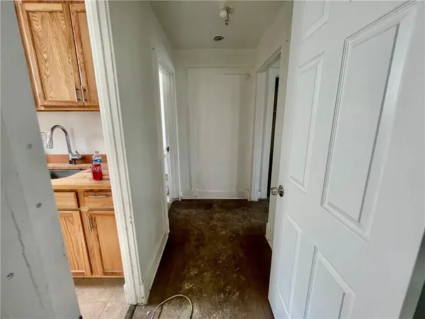 a room with furniture and a flat screen tv