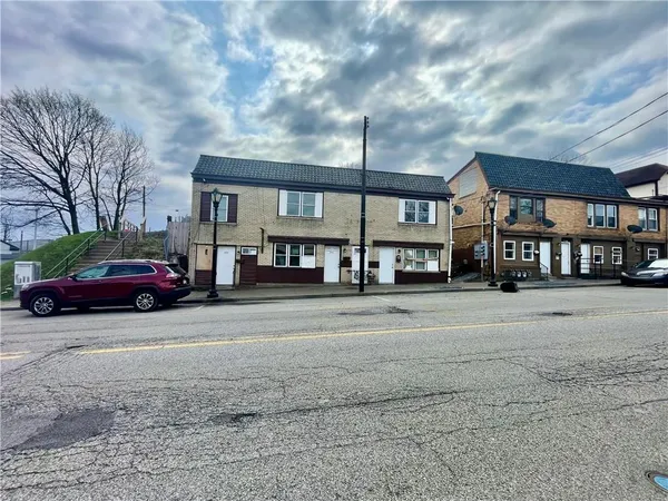 a car parked in front of a building